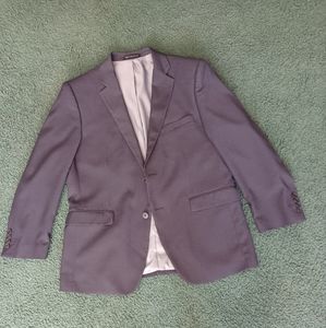 Men's navy blue medium weight 2 button jacket.